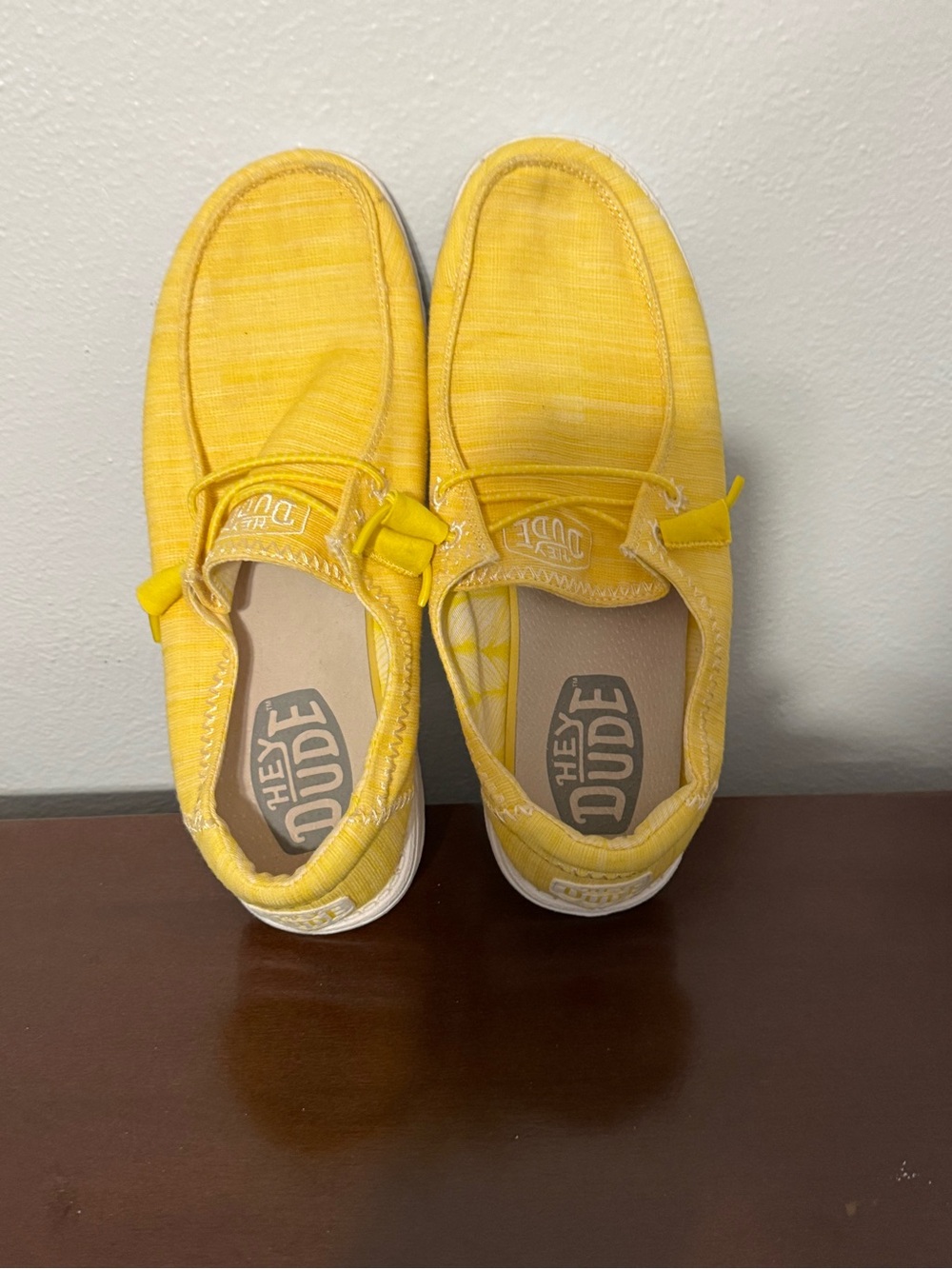 Hey Dude women’s Sunshine Yellow Slip-On Sneakers